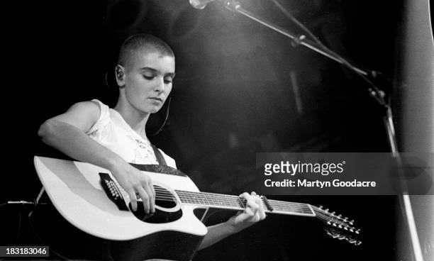 Sinead O'Connor performs on stage at Glastonbury , United Kingdom, 1990.