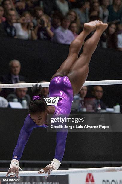 Simone Biles of USA competes in the Uneven Bars Final on Day Six of the Artistic Gymnastics World Championships Belgium 2013 held at the Antwerp...