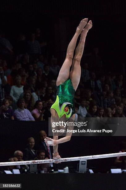 Jinnan Yao of China competes in the Uneven Bars Final on Day Six of the Artistic Gymnastics World Championships Belgium 2013 held at the Antwerp...