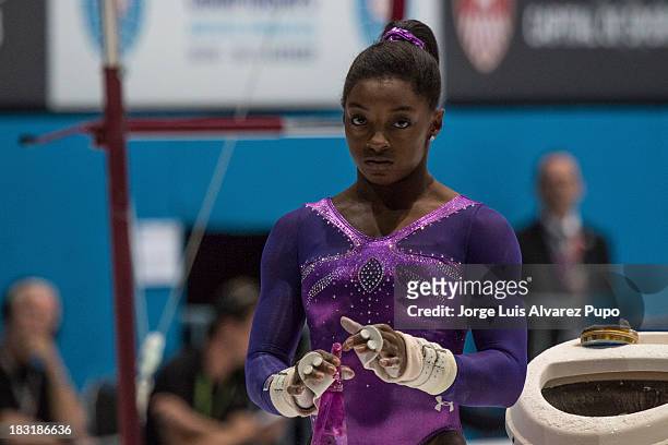 Simone Biles of USA prepares for the Uneven Bars Final on Day Six of the Artistic Gymnastics World Championships Belgium 2013 held at the Antwerp...