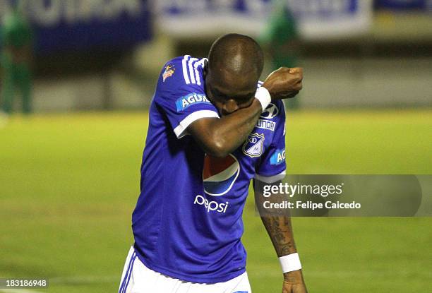 Wason Renteria of Millonarios celebrates a scored goal during a match between Millonarios and Patriotas FC as part of the Liga Postobon II 2013 at La...