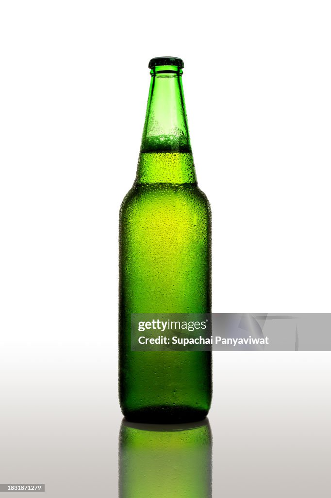 Beer bottle with droplet and reflection, Studio shot, clipping path