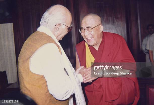 Deputy Prime Minister L.K. Advani greets Tibetan spiritual leader the Dalai Lama in New Delhi on September 16, 2000.