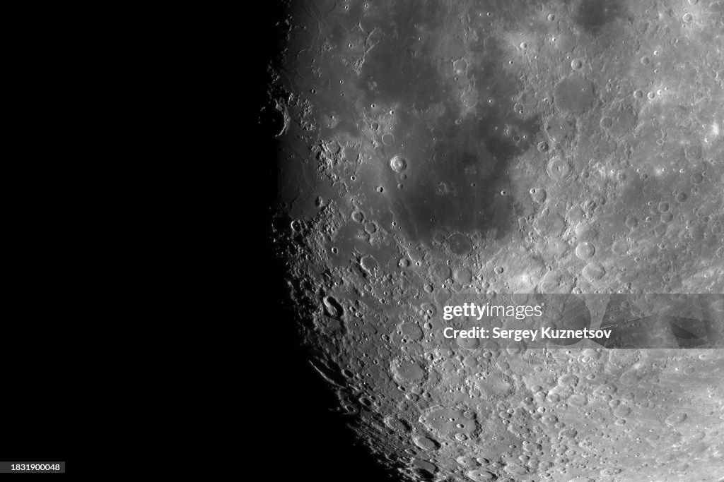 Lunar surface. Photo of the moon through a telescope.
