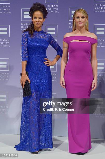 Sherri Saum and Teri Polo attend the 2013 HRC National Dinner at Washington Convention Center on October 5, 2013 in Washington, DC.