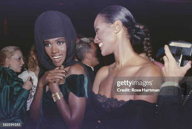 Jamaican singer, actress and model Grace Jones with American model/actress Beverly Johnson, 1988.