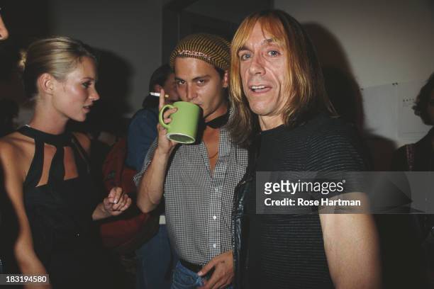 English model Kate Moss, American actor and film producer Johnny Depp , and American singer-songwriter, Iggy Pop, at the 'Kate: The Kate Moss Book'...