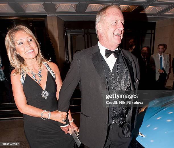 Jane Bird and Chris Tarrant sighted leaving the Dorchester Hotel, Park Lane on October 5, 2013 in London, England.