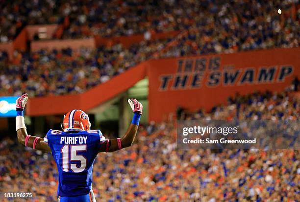 Loucheiz Purifoy of the Florida Gators asks the crowd for noise during the game against the Arkansas Razorbacks at Ben Hill Griffin Stadium on...
