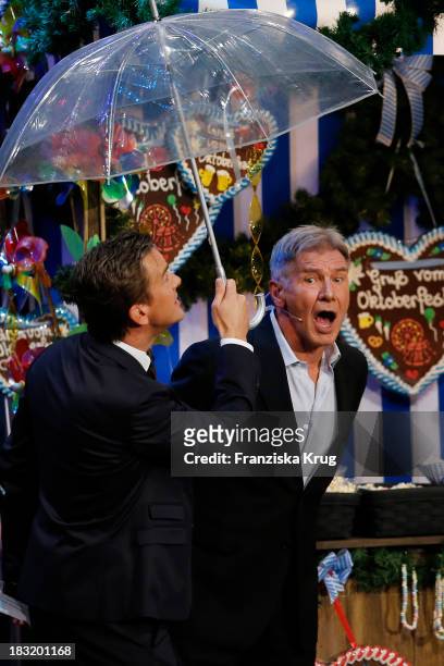 Harrison Ford and Markus Lanz attend 'Wetten, dass..?' from Bremen at Messe-Bremen on October 05, 2013 in Bremen, Germany.