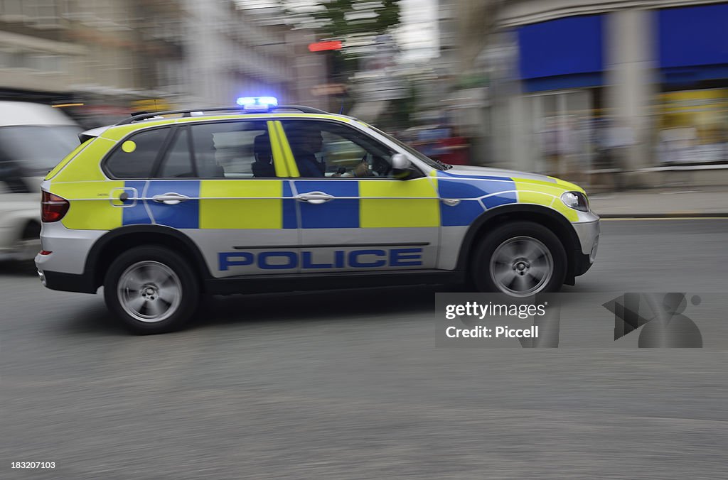 Police car on signal, blurred motion