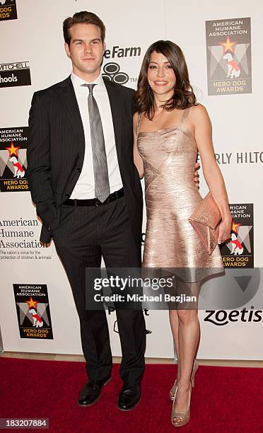 Dancer McGee Maddox and actress Emmanuelle Vaugier arrive at the 3rd Annual American Humane Association Hero Dog Awards at The Beverly Hilton Hotel...