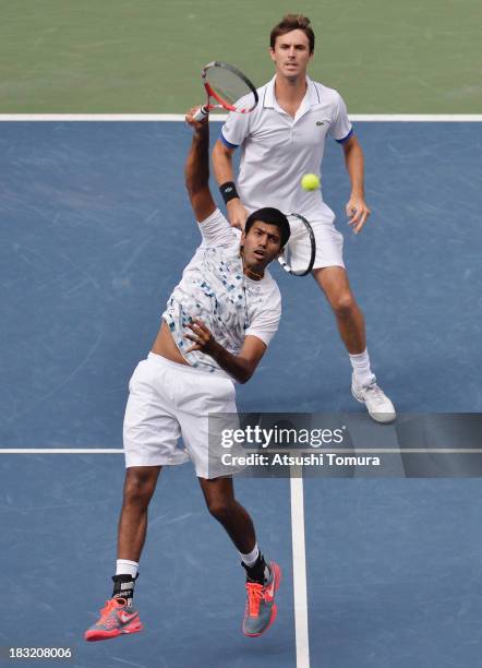 Rohan Bopanna of India and Edouard Roger-Vasselin of France in action during men's doubles final match against Jamie Murray of Great Britain and John...