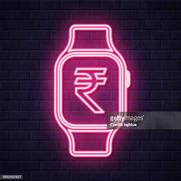 smartwatch with indian rupee sign. glowing neon icon on brick wall background - clock on wall stock illustrations