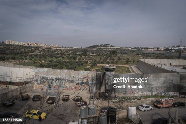 The border wall is seen as Palestinians at Aida Refugee Camp living their daily lives in fear due to the attacks by Israeli forces and Jewish...