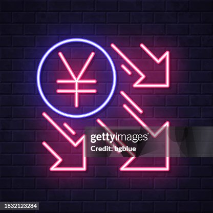 Yen decrease. Glowing neon icon on brick wall background Yen decrease. Glowing neon icon on brick wall background