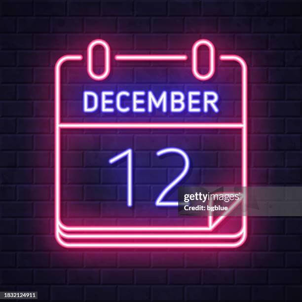stockillustraties, clipart, cartoons en iconen met december 12. glowing neon icon on brick wall background - day 12