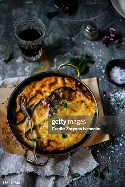 greek moussaka in a frying  pan - moussaka stock pictures, royalty-free photos & images