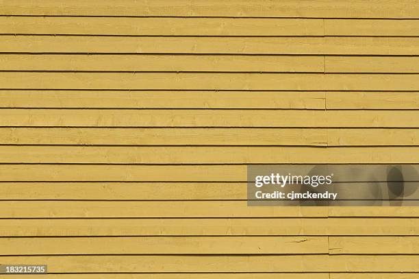 mustard yellow wooden siding - weatherboard stock pictures, royalty-free photos & images