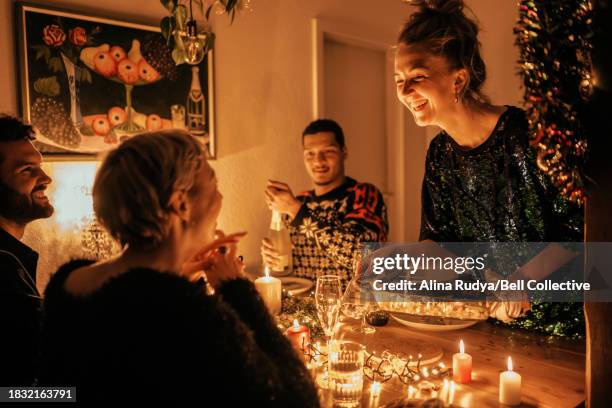 group of friends at a festive dinner table - middag bildbanksfoton och bilder