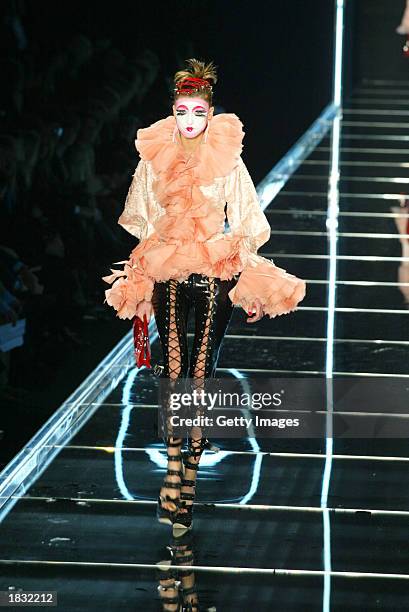 Model wears an outfit created by John Galliano for French fashion house Christian Dior during their Fall/Winter 2004 ready-to-wear collection March...