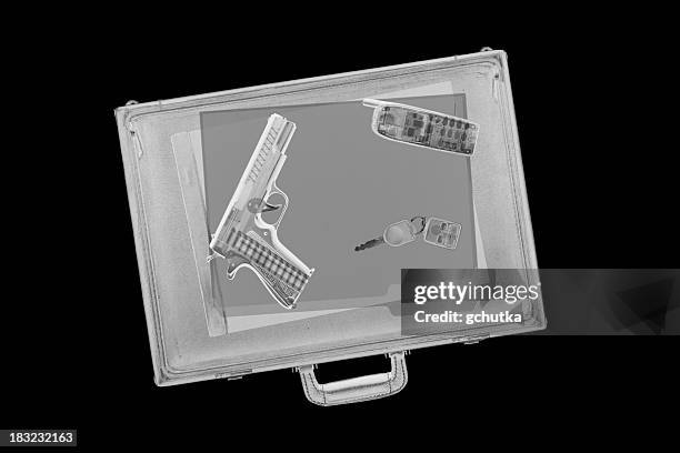 briefcase with gun - smuggling stock pictures, royalty-free photos & images