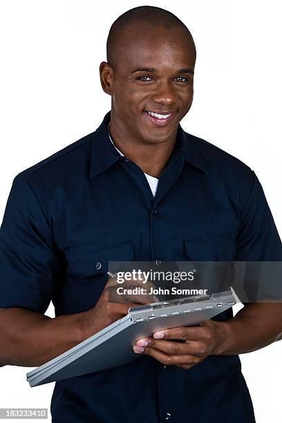 blue collar worker writing - delivery person on white stock pictures, royalty-free photos & images