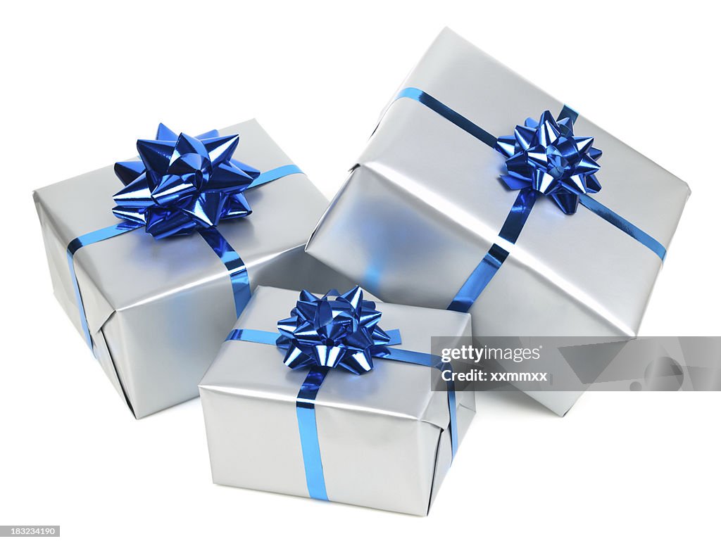Silver gift boxes with blue bows