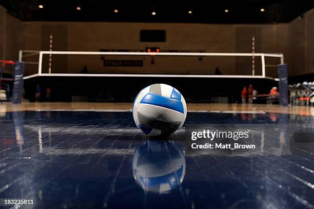 volleyball in an empty gym - volleyball player stock pictures, royalty-free photos & images