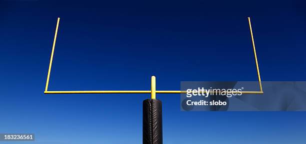 goal post against blue sky - football goal post stock pictures, royalty-free photos & images