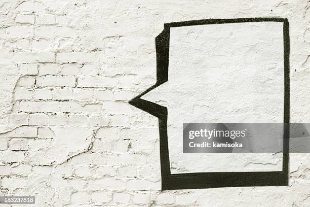 speech balloon on white wall - graffiti artists stock pictures, royalty-free photos & images