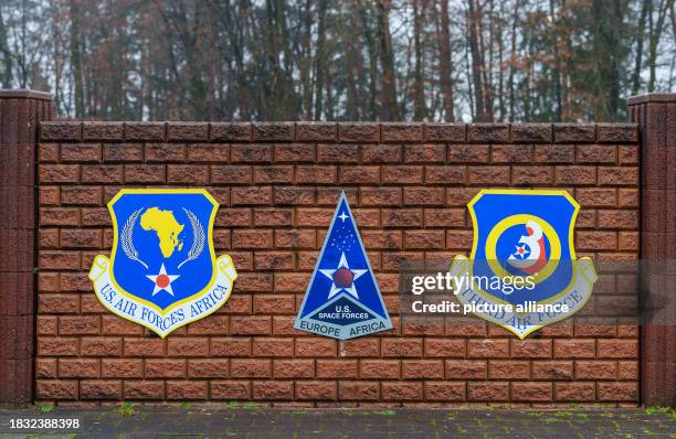 December 2023, Rhineland-Palatinate, Ramstein-Miesenbach: The symbols of the U.S. Air Forces Africa , the U.S. Space Forces and the Third Air Force,...