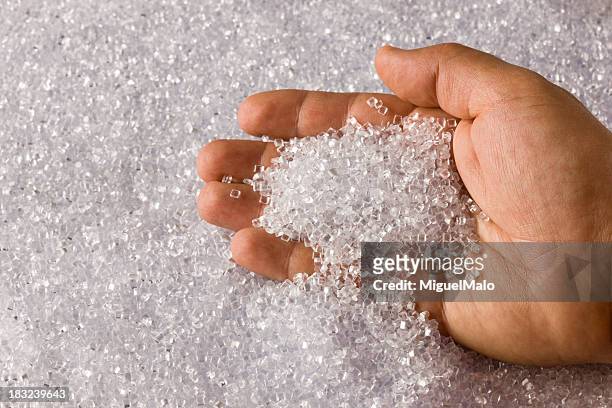 plastic resin pellets - material stock pictures, royalty-free photos & images
