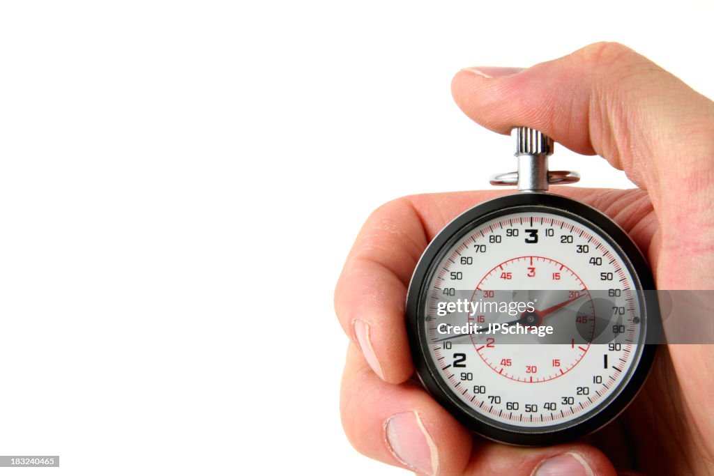 Stopwatch in hand on white background