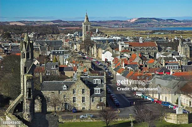 cityscape of st andrews showing a view towards mountains - st andrews scotland stock pictures, royalty-free photos & images