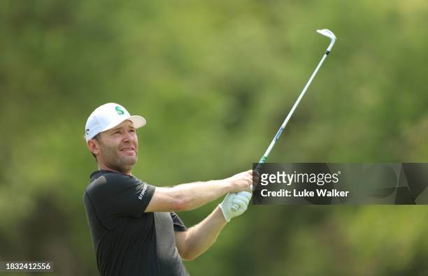 Branden Grace of South Africa plays a shot prior to the Alfred Dunhill Championship at Leopard Creek Country Club on December 05, 2023 in Malelane,...
