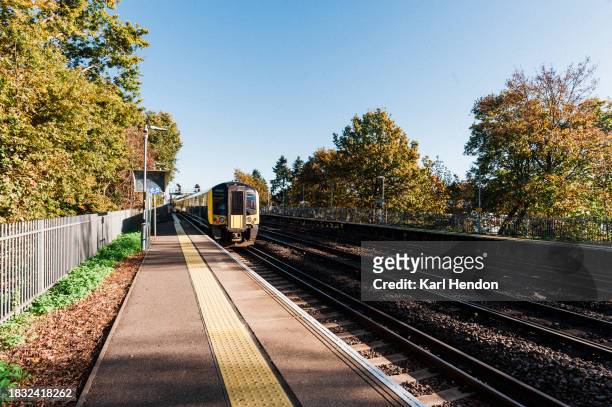 the morning train - surrey stock pictures, royalty-free photos & images