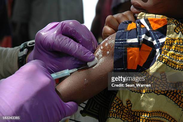 vaccinations in africa - vaccine development stock pictures, royalty-free photos & images