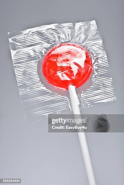 red lollipop - lolly stockfoto's en -beelden