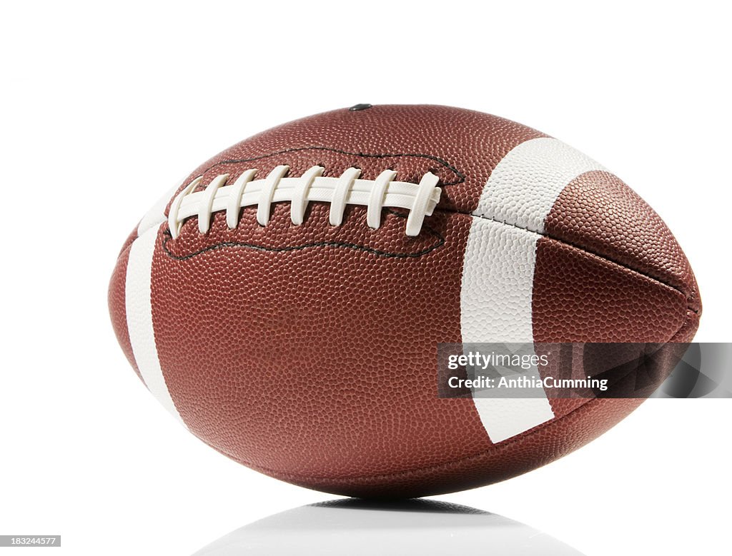 Close-up of American football isolated in white