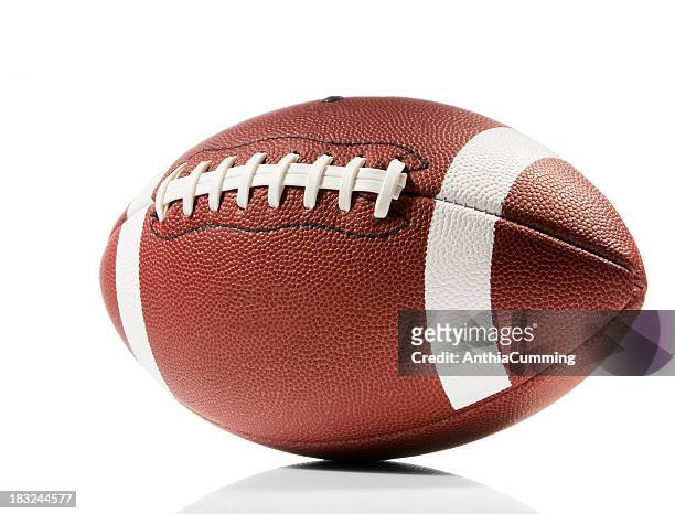 close-up of american football isolated in white - american football stock pictures, royalty-free photos & images