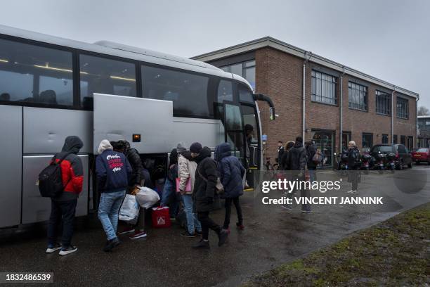 Asylum seekers from the AZC in Ter Apel arrive at the crisis shelter for asylum seekers in the student housing complex The Village in Groningen, on...