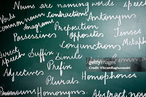 english grammar text handwritten on greenboard - england stock pictures, royalty-free photos & images