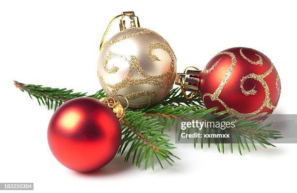 red and white christmas bulbs and tree branch - christmas decorations isolated stock pictures, royalty-free photos & images