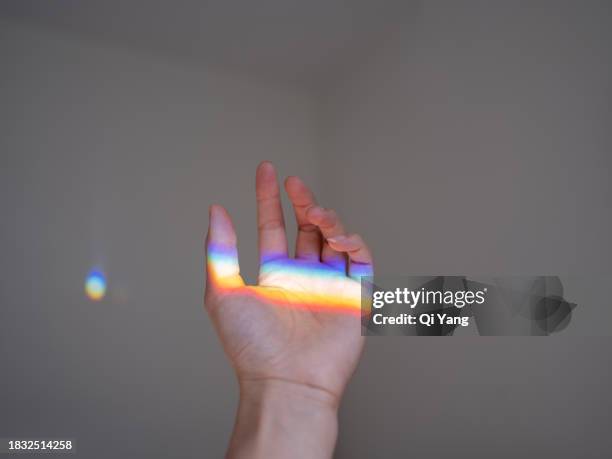 touching the rainbow - prisma stockfoto's en -beelden