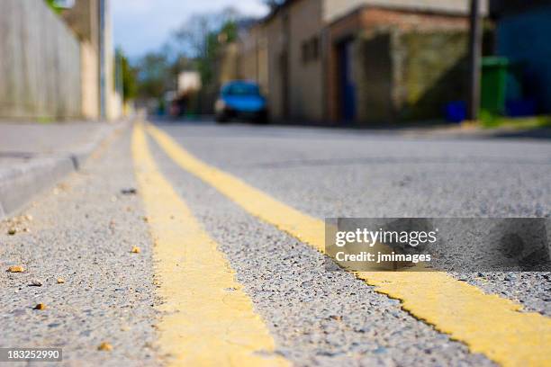 double yellow lines - curb stock pictures, royalty-free photos & images