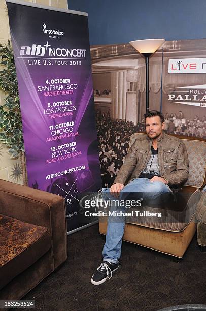 Electronic music artist ATB poses backstage at Hollywood Palladium on October 5, 2013 in Hollywood, California.