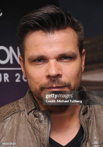 Electronic music artist ATB poses backstage at Hollywood Palladium on October 5, 2013 in Hollywood, California.