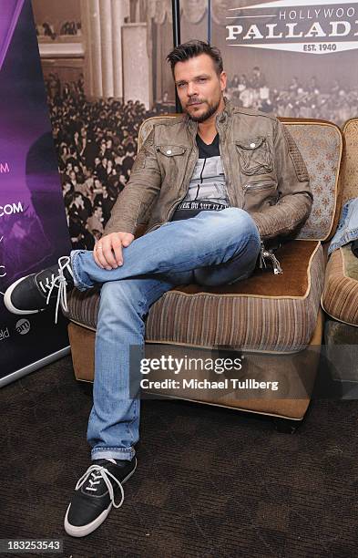 Electronic music artist ATB poses backstage at Hollywood Palladium on October 5, 2013 in Hollywood, California.