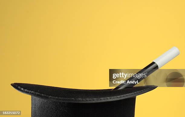 magic props on yellow with space for copy - hats stockfoto's en -beelden